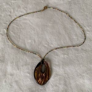 Glass medallion with beaded chain. **BOGO same or less$